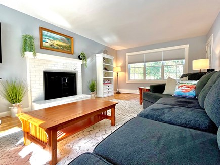 Marstons Mills Cape Cod vacation rental - Living room with large sectional and gas fireplace