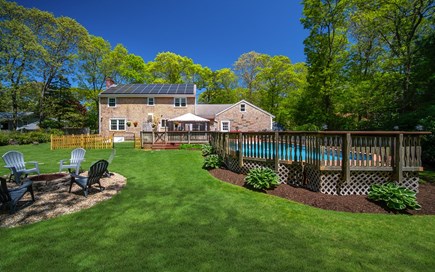 Marstons Mills Cape Cod vacation rental - View of pool, firepit and dog park area