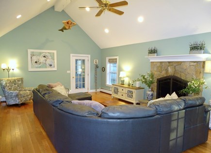 Falmouth Cape Cod vacation rental - Large living room with sectional couch, fireplace
