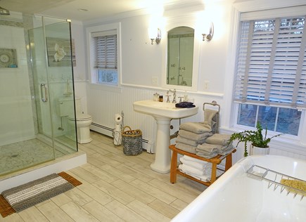 Falmouth Cape Cod vacation rental - Lovely main floor bathroom with glass shower and claw tub