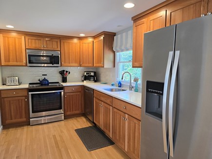 Harwichport Cape Cod vacation rental - Beautiful kitchen with new quartz countertop and backsplash.