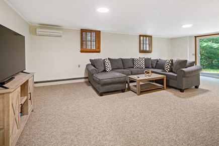 Eastham Cape Cod vacation rental - Sectional sofa in the large basement rec room