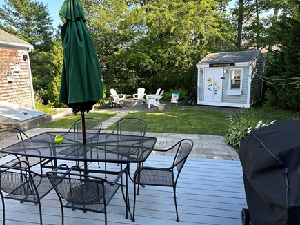 South Yarmouth Cape Cod vacation rental - Deck with outside table and umbrella and grill