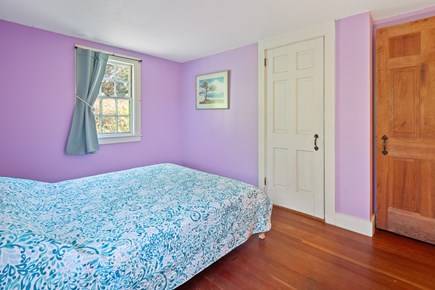 Wellfleet Cape Cod vacation rental - Bedroom with a queen bed and a closet for storage
