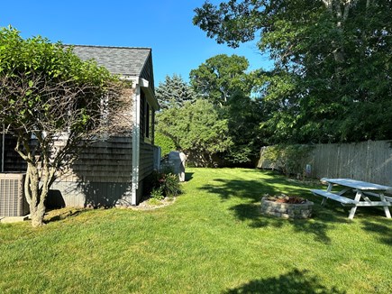 South Yarmouth Cape Cod vacation rental - Back yard, fire pit, picnic table