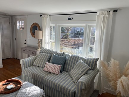Sandwich Cape Cod vacation rental - Cozy living room, pull out sleeper couch and matching chair