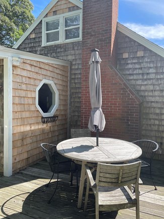 Sandwich Cape Cod vacation rental - Large round table with umbrella. Seats 4-8