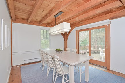 West Falmouth Cape Cod vacation rental - Dining room with seating for 8+ and sliding door to back deck