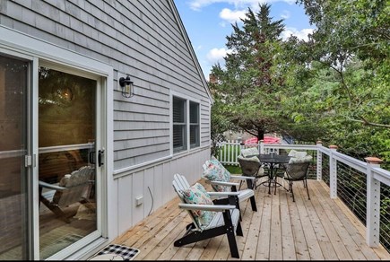 Harwich Cape Cod vacation rental - Back Deck with fire-pit