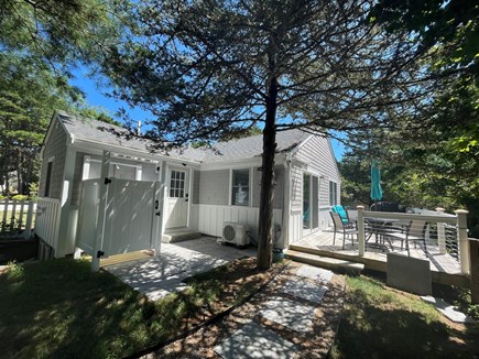 Harwich Cape Cod vacation rental - Back yard with deck and outdoor shower!