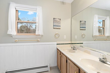 Eastham Cape Cod vacation rental - Full bathroom with tub, shower, and double vanity sink