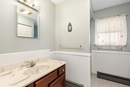 Eastham Cape Cod vacation rental - Full bathroom with a stand up shower and laundry
