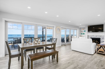 East Sandwich Cape Cod vacation rental - Dining area and living room with sliders to deck
