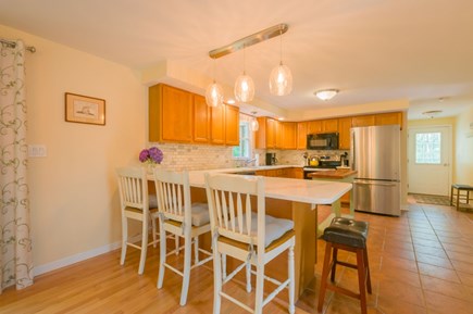 Mashpee Cape Cod vacation rental - Seating for 3 in the kitchen.