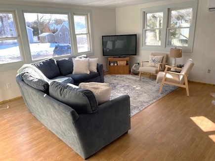 North Falmouth Cape Cod vacation rental - Living Space: Fresh Paint, BIG Couch, Addtl Seating, 55" TV