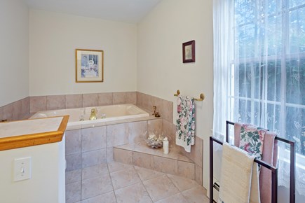 Brewster Cape Cod vacation rental - Primary ensuite bathroom with a large jacuzzi soaking tub
