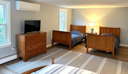East Falmouth Cape Cod vacation rental - 2nd floor bedroom with two twin beds, queen bed and TV