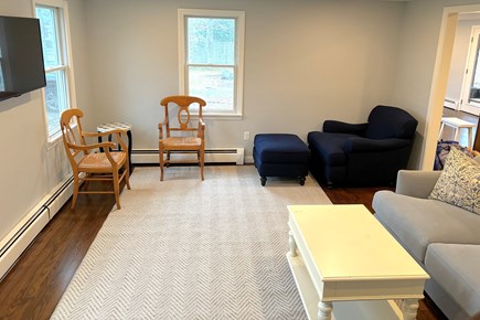 East Falmouth Cape Cod vacation rental - Family room off the kitchen with TV