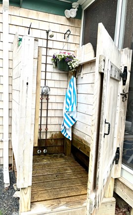 East Falmouth Cape Cod vacation rental - Rinse off in the outdoor shower after a long day at the beach.