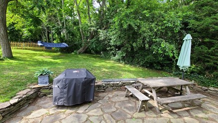 Wellfleet Cape Cod vacation rental - Patio off cottage with picnic table and gas grill