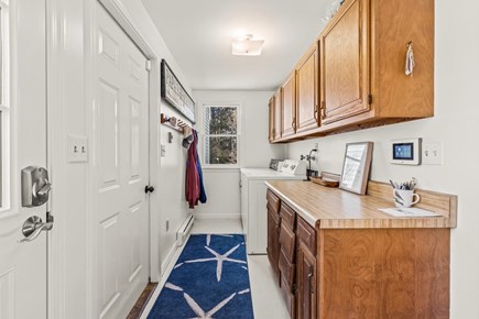 Eastham Cape Cod vacation rental - Laundry and back hall.Half bath. Garage and backyard access.
