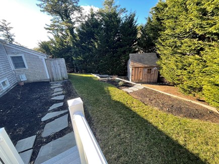 Harwich Cape Cod vacation rental - View from back deck - outdoor shower and fire pit. Very private
