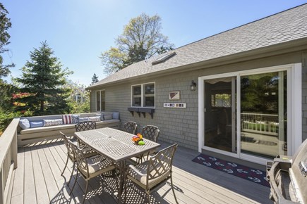 Dennis Village Cape Cod vacation rental - Large deck & grill overlooking the backyard