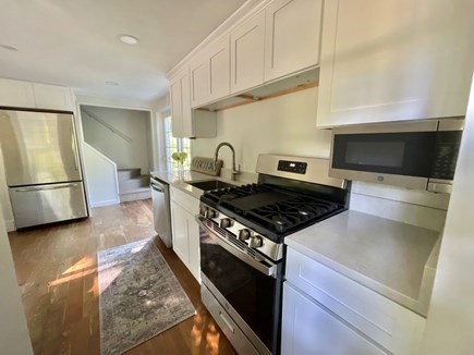 North Falmouth Cape Cod vacation rental - New kitchen includes gas stove, oven, dishwasher, and microwave.