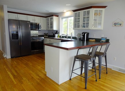 Harwich Cape Cod vacation rental - Kitchen with all new appliances, breakfast bar