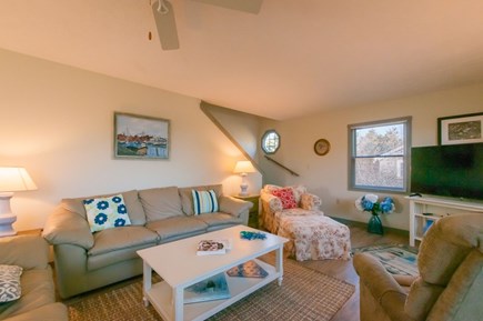 Bourne Cape Cod vacation rental - Living room with stairs leading to second floor