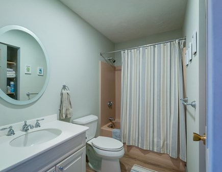 Bourne Cape Cod vacation rental - Bathroom one, main floor with shower/tub combo