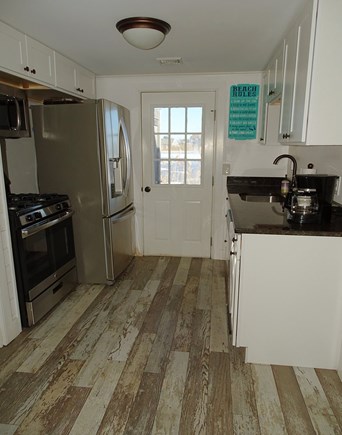 West Dennis Cape Cod vacation rental - Kitchen with all appliances, faces towards marsh