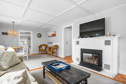 Chatham Cape Cod vacation rental - Open living/dining room area with gas fireplace