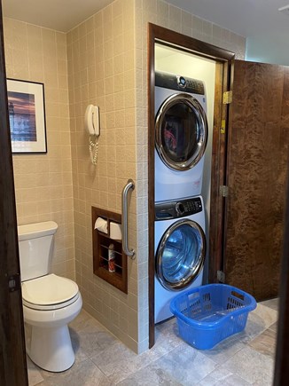 North Truro Cape Cod vacation rental - First floor bathroom has convenient laundry facilities.
