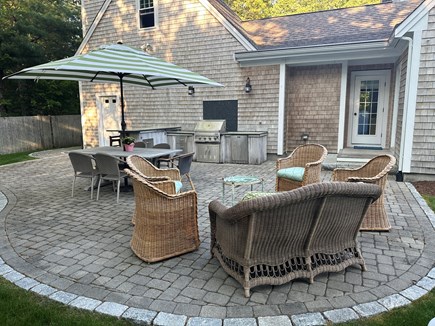Osterville Cape Cod vacation rental - Bar seating for 4, Umbrella table for 8, Loveseat with 4 Chairs