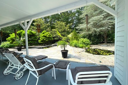 Centerville Cape Cod vacation rental - Covered patio with ample space for lounging.