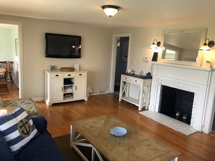Hyannis Cape Cod vacation rental - Living room showing hallway and dining room
