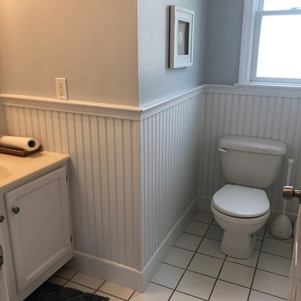 Hyannis Cape Cod vacation rental - First floor half bath off hallway outside of living room