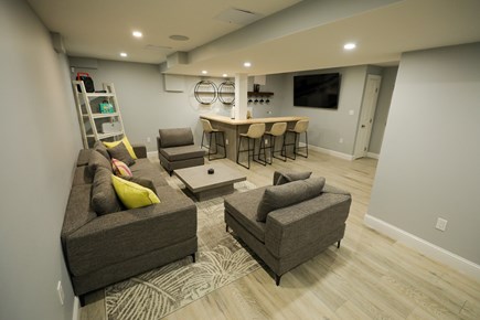 Sandwich Cape Cod vacation rental - Lower level Play room with Sonos system - bar and sitting area