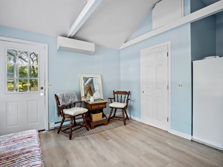 Chatham Cape Cod vacation rental - Living Room, Mini Split Heat/AC, Bathroom Door