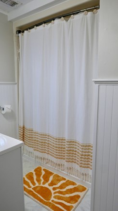 Falmouth Cape Cod vacation rental - Bathroom with tub shower, just off the kitchen.