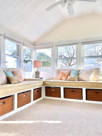 Falmouth Cape Cod vacation rental - Sunroom with additional TV and leads into backyard.
