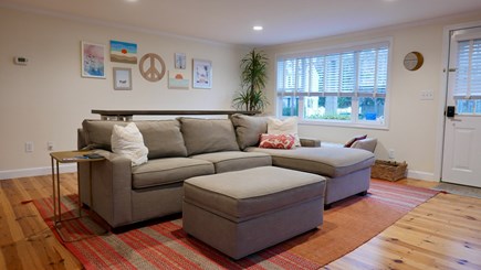 Falmouth Cape Cod vacation rental - Enter into the main living area with large sectional and Smart TV
