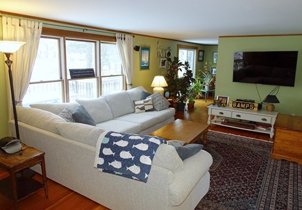 Centerville Cape Cod vacation rental - Living room with TV, windows facing deck