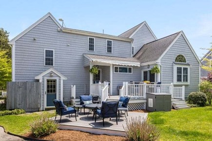 Bourne Cape Cod vacation rental - Back yard with expanded deck and outdoor shower
