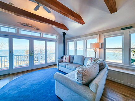 Brewster Cape Cod vacation rental - Upper level living area with panoramic water views, opens to deck
