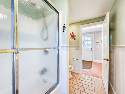 Brewster Cape Cod vacation rental - Main level, shared full bathroom with tub and shower.