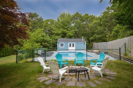 East Falmouth Cape Cod vacation rental - Fire pit next to pool area