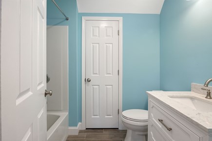 Brewster Cape Cod vacation rental - Hall bathroom with shower / tub combo