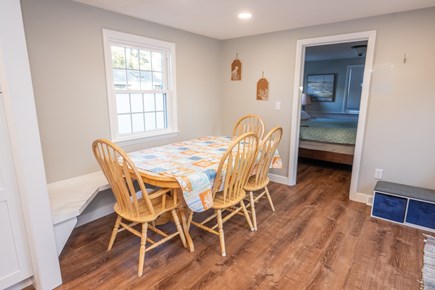 Dennisport Cape Cod vacation rental - Dedicated dining area with beach seat - seats up to 10.